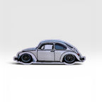 Classic front-trunk Super Beetle woven patch displayed for custom Frunk Club bundles