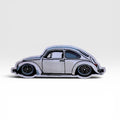 Super Beetle-inspired Frunk Club woven patch with classic VW silhouette artwork