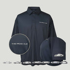The Frunk Club dark navy polo shirt with embroidered logo on chest and car patch on sleeve. Customizable.