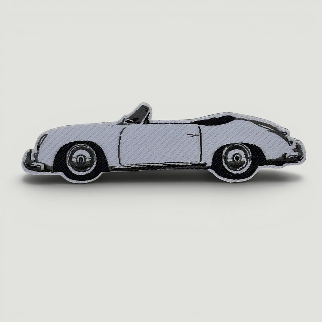 The Frunk Club Pit Lane Bundle custom woven patch featuring a white convertible sports car.