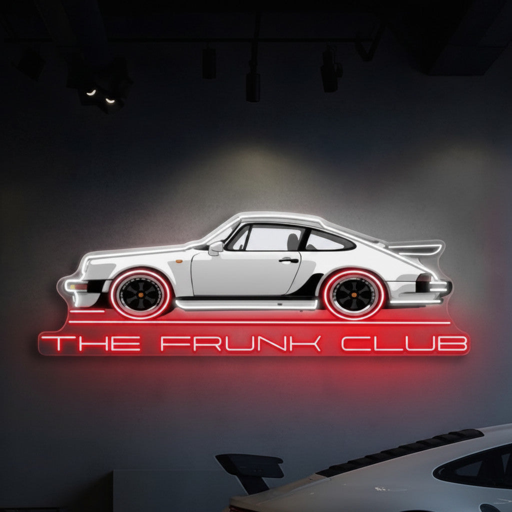 The Frunk Club white Porsche 911 LED neon wall art sign with red wheels and red "THE FRUNK CLUB" lettering.