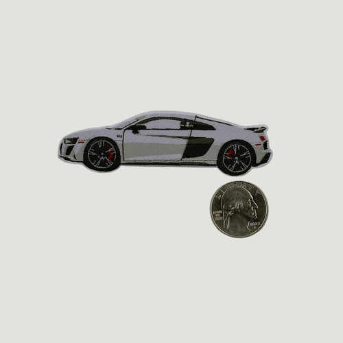The Frunk Club white Audi R8 woven patch with black accents and red brake calipers. Features V10 emblem.
